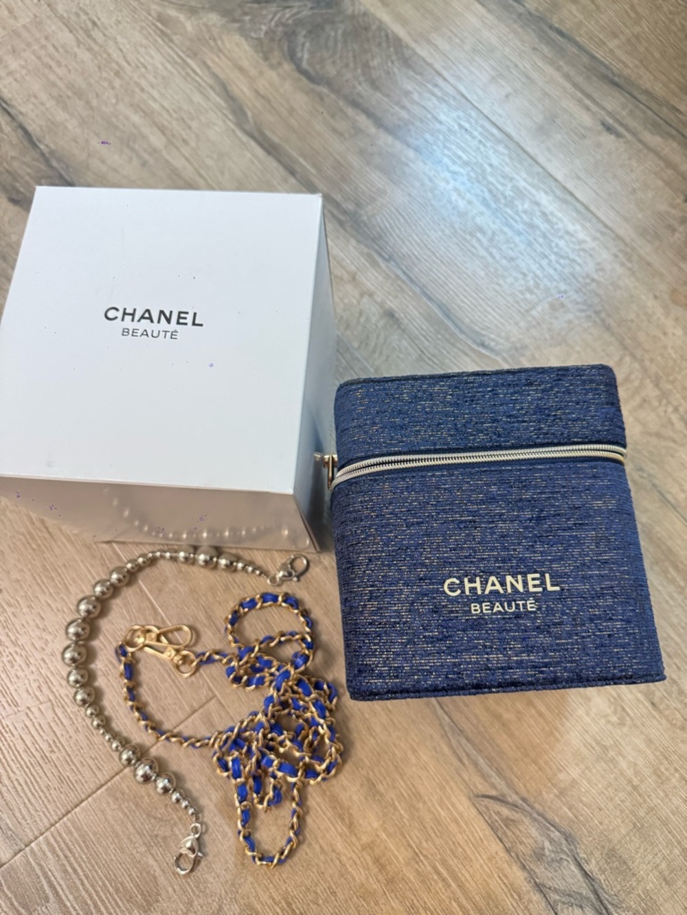 CHANEL Blue Quilted Cosmetics Case with Gold Logo